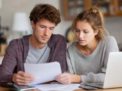 couple-reviewing-finances-at-home